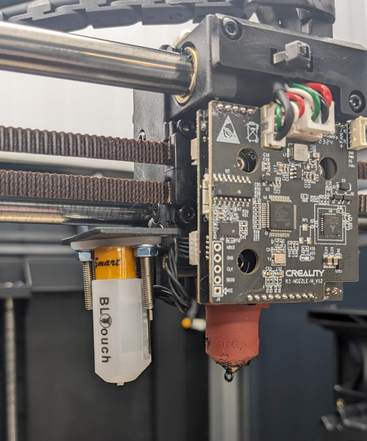 A BLTouch on a Creality K1 Max, without fan shroud