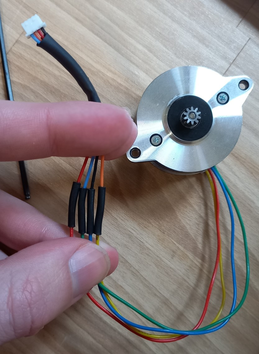 An LGX motor spliced onto the K1 motors connector.